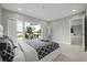 Bright bedroom featuring a patio, tile floors, and a comfortable bed at 6665 Lake Cane Dr, Orlando, FL 32819