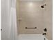 Modern bathroom with shower, bronze fixtures, and a built in seat at 6991 Sugar Creek Path, The Villages, FL 34762