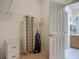 Walk-in closet with wire shelving and storage organizers; features a white door at 8195 Se 174Th Rowland St, The Villages, FL 32162