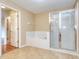 Clean bathroom featuring a tub, shower, and tile floors at 832 Willow Run St, Minneola, FL 34715