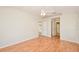 Spacious bedroom with hardwood floors and ample natural light at 832 Willow Run St, Minneola, FL 34715