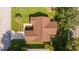 Aerial view of a well-maintained house with manicured lawn and mature trees at 8537 Se 177Th Bartram Loop, The Villages, FL 32162