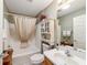 Bathroom featuring a combination shower and tub, vanity, and tile floor at 8537 Se 177Th Bartram Loop, The Villages, FL 32162