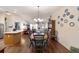 Open concept home with dining room in view of kitchen and living room at 8537 Se 177Th Bartram Loop, The Villages, FL 32162
