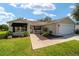 Charming home featuring a small front porch and well-maintained landscaping at 8537 Se 177Th Bartram Loop, The Villages, FL 32162