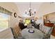 Open living room and dining area with ample seating and natural light at 8537 Se 177Th Bartram Loop, The Villages, FL 32162