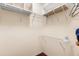 Spacious walk-in closet with ample shelving and storage space for organizing clothes and personal belongings at 891 Lucky Ln, The Villages, FL 32162
