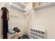 Spacious walk-in closet with wire shelving and organizational features at 891 Lucky Ln, The Villages, FL 32162