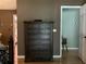 Bathroom featuring a shower stall with colorful curtains and hardwood floors at 9375 Woodbreeze Blvd, Windermere, FL 34786