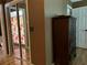 Bathroom showcasing a shower with colorful curtains and hardwood floors at 9375 Woodbreeze Blvd, Windermere, FL 34786