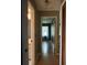 Hallway with hardwood floors offering access to bathroom and bedroom at 9375 Woodbreeze Blvd, Windermere, FL 34786