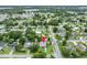 Aerial view with a red pin pointing to the property and neighborhood, lush with trees and convenient road access at 1 W Pierce Ave, Orlando, FL 32809