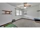 Cozy bedroom with neutral walls, ceiling fan, and comfortable carpet flooring, great natural light at 1 W Pierce Ave, Orlando, FL 32809