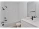 Bright bathroom featuring a bathtub, tiled shower, toilet, and modern vanity at 10061 Dulbecco St, Orlando, FL 32827
