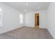 Spacious bedroom with soft carpet and ample natural light, providing a serene and comfortable retreat at 10061 Dulbecco St, Orlando, FL 32827