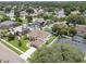 Residential neighborhood showcasing homes with private pools amidst lush landscaping at 1109 Needlewood Loop, Oviedo, FL 32765