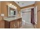 Traditional bathroom featuring granite vanity, tile floors, and a shower with updated fixtures at 1109 Needlewood Loop, Oviedo, FL 32765