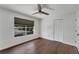 The bedroom features hardwood floors, a ceiling fan, and a closet at 1109 Needlewood Loop, Oviedo, FL 32765