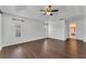Large, bright bedroom with wood floors, a ceiling fan, and plenty of natural light at 1109 Needlewood Loop, Oviedo, FL 32765