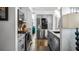 Modern kitchen featuring stainless steel appliances, granite countertops, and gray cabinetry at 1130 Woodsong Way, Clermont, FL 34714