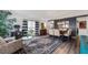 Inviting living room features stylish decor, hardwood floors, and plenty of natural light at 1130 Woodsong Way, Clermont, FL 34714