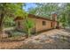 Exterior shot of home's backyard with small palm tree at 161 Cindy Ct, Lake Mary, FL 32746