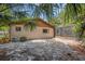 Exterior shot of home's backyard with view of screened-in pool at 161 Cindy Ct, Lake Mary, FL 32746