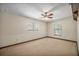 Bedroom with carpet, two windows and ceiling fan at 161 Cindy Ct, Lake Mary, FL 32746