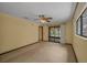 Bedroom with a sliding glass door leading to a screened porch at 161 Cindy Ct, Lake Mary, FL 32746