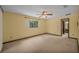 Bedroom featuring carpeted floors, a ceiling fan, and a window at 161 Cindy Ct, Lake Mary, FL 32746