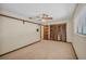 Neutral bedroom featuring a ceiling fan, window, and wood-paneled closet at 161 Cindy Ct, Lake Mary, FL 32746