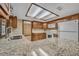 Kitchen features granite counters, oak cabinets, and stainless appliances at 161 Cindy Ct, Lake Mary, FL 32746