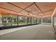 Screened porch with ceiling fans and a view of the surrounding yard at 161 Cindy Ct, Lake Mary, FL 32746