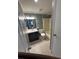 Bathroom featuring modern vanity, neutral paint, and tiled floors, and a shower/tub combo at 1626 Cypress Pt, Lady Lake, FL 32159