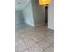Spacious living room featuring tile flooring and plenty of natural light at 1626 Cypress Pt, Lady Lake, FL 32159