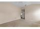 Spacious bedroom featuring neutral carpet and light-colored walls at 1730 Dorset Dr, Mount Dora, FL 32757