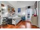 Bedroom with wood floors, light colored walls and an abundance of natural lighting at 17428 Woodfair Dr, Clermont, FL 34711