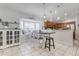Open-concept dining area with kitchen views at 17428 Woodfair Dr, Clermont, FL 34711