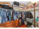 Walk-in closet with built-in shelving and ample storage space at 17428 Woodfair Dr, Clermont, FL 34711