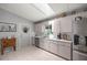 Updated kitchen featuring stainless steel appliances, plenty of counter space, and natural light at 17533 Se 96Th Ct, Summerfield, FL 34491
