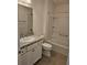 Bathroom vanity and shower at 1964 Rhett Rd, The Villages, FL 32163