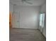 Bedroom featuring doorway and large window at 1964 Rhett Rd, The Villages, FL 32163