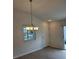 Dining room features a chandelier at 1964 Rhett Rd, The Villages, FL 32163