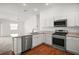 Bright kitchen with stainless steel appliances and stylish countertops at 1964 Rhett Rd, The Villages, FL 32163