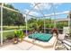 Relaxing outdoor hot tub with lush greenery and privacy screen at 219 Carrera Dr, The Villages, FL 32159
