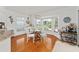 Bright breakfast nook with large windows offering natural light, creating a cheerful dining area at 219 Carrera Dr, The Villages, FL 32159