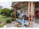 Inviting front porch with outdoor seating and decorative accents at 2202 Butler St, Leesburg, FL 34748