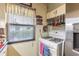 Kitchen with a gas range and stainless steel refrigerator at 2202 Butler St, Leesburg, FL 34748