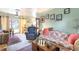 Cozy living room with comfortable seating and sliding door to deck at 2202 Butler St, Leesburg, FL 34748
