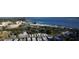 Picturesque aerial view of a mobile home community near the water at 239 Rue De Fontaine, Tavares, FL 32778